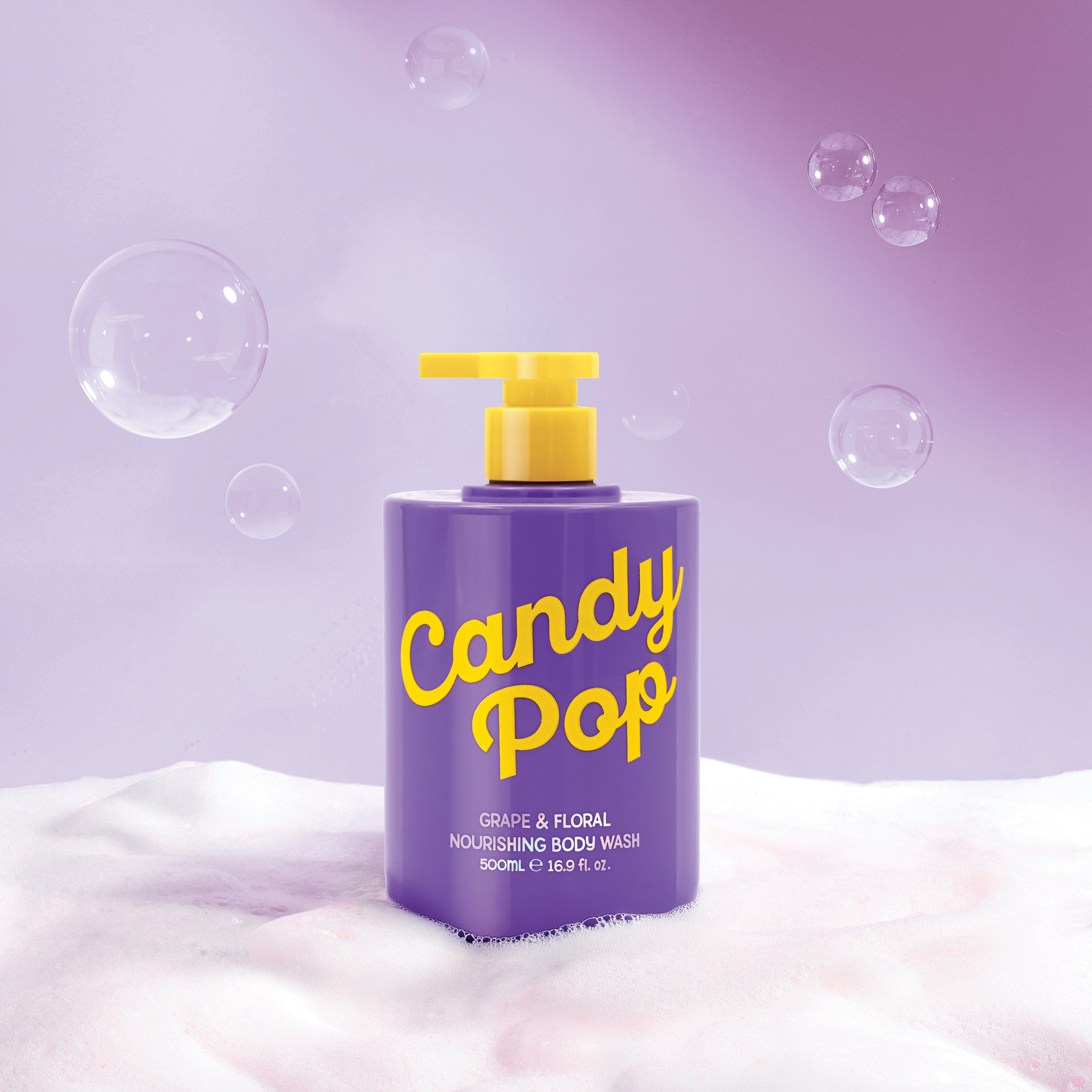 Purple body wash bottle with yellow pump and 'Candy Pop' text on a purple background with bubbles.